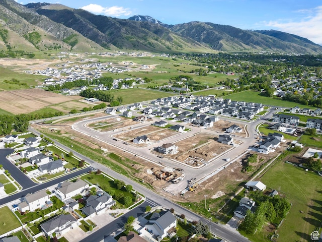 233 E 580 N, Providence, UT 84332 - aerial overview of property's location with nearby suburban area and mountains