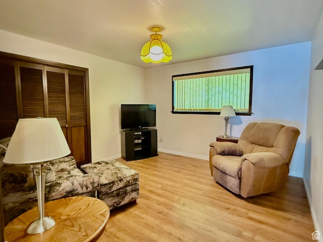 1177 W 2060 N, Helper, UT 84526 - living area with light wood-style flooring and baseboards