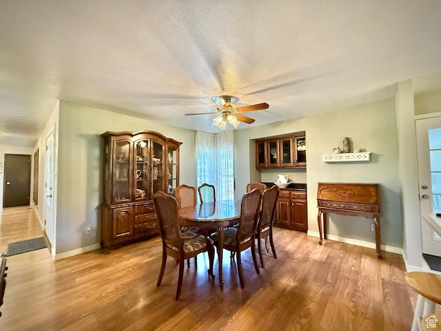 1177 W 2060 N, Helper, UT 84526 - dining space featuring light wood-style flooring and a ceiling fan