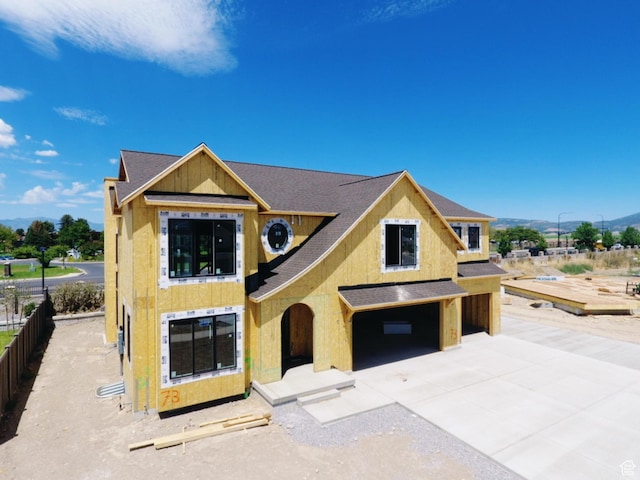 1053 N 930 E Unit 73, American Fork, UT 84003 - property in mid-construction featuring a garage, concrete driveway, a shingled roof, and stucco siding