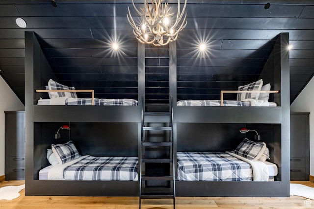1766 W Arapaho Dr, Wanship, UT 84017 - bedroom featuring wood finished floors, a chandelier, and a sauna