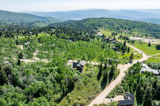 1766 W Arapaho Dr, Wanship, UT 84017 - bird's eye view of a heavily wooded area and a mountain backdrop