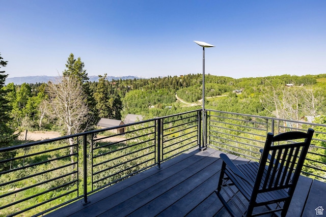 1766 W Arapaho Dr, Wanship, UT 84017 - wooden terrace featuring a view of trees and a mountain view