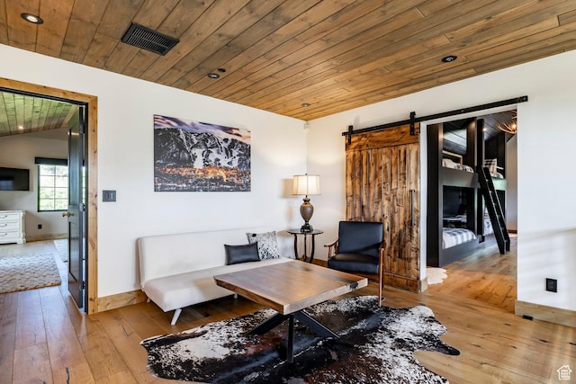 1766 W Arapaho Dr, Wanship, UT 84017 - sitting room featuring light wood-type flooring, a barn door, and wooden ceiling