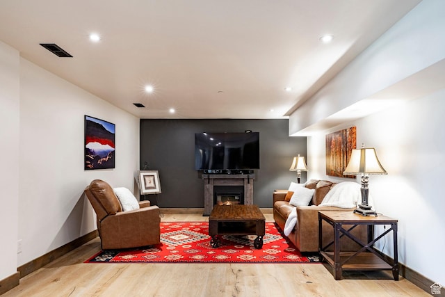 1766 W Arapaho Dr, Wanship, UT 84017 - living area featuring wood finished floors, recessed lighting, and a glass covered fireplace