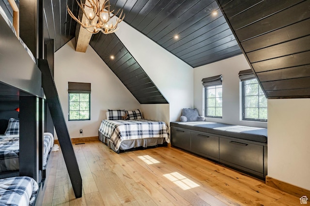 1766 W Arapaho Dr, Wanship, UT 84017 - bedroom with lofted ceiling, a chandelier, light wood finished floors, multiple windows, and wooden ceiling