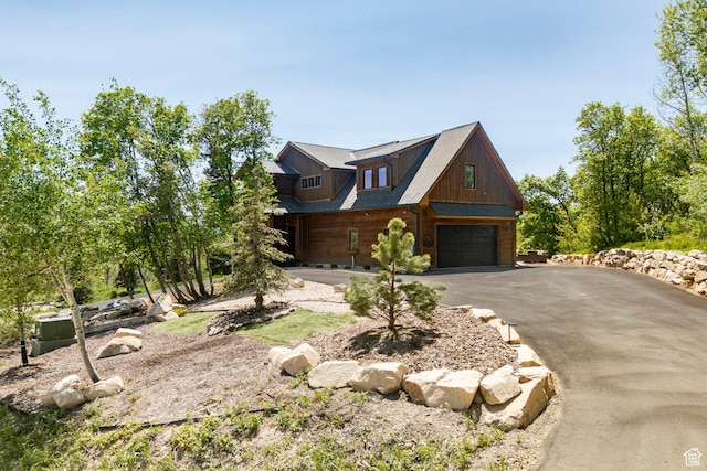 1766 W Arapaho Dr, Wanship, UT 84017 - view of front of home with driveway and a garage