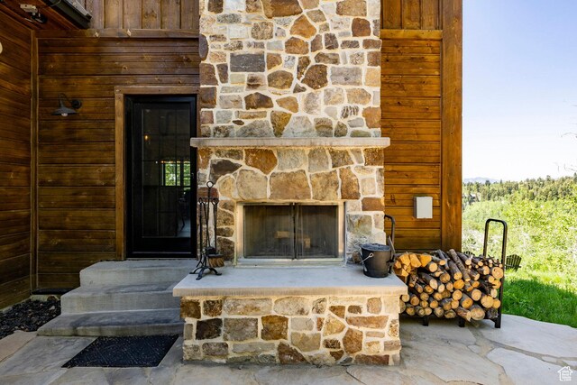 1766 W Arapaho Dr, Wanship, UT 84017 - detailed view of a fireplace and stone siding