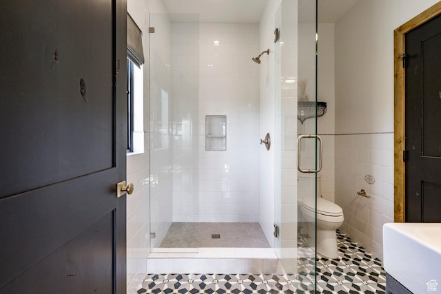 1766 W Arapaho Dr, Wanship, UT 84017 - bathroom featuring a shower stall, tile patterned flooring, tile walls, and vanity