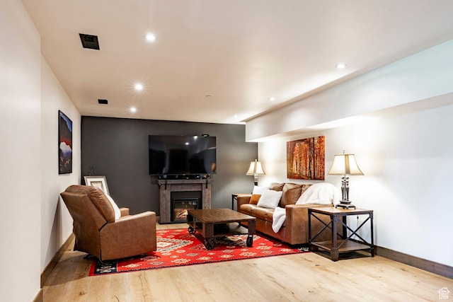 1766 W Arapaho Dr, Wanship, UT 84017 - living area with wood finished floors, recessed lighting, and a glass covered fireplace