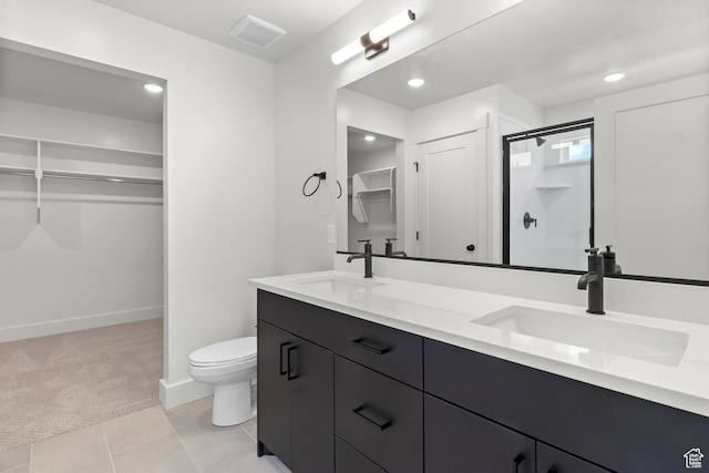 216 E 610 N, Providence, UT 84332 - bathroom featuring a spacious closet, double vanity, a shower stall, tile patterned floors, and recessed lighting