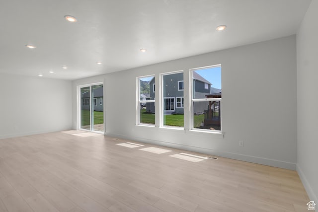 216 E 610 N, Providence, UT 84332 - unfurnished room with light wood-style floors and recessed lighting