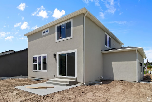 216 E 610 N, Providence, UT 84332 - back of property featuring stucco siding and entry steps