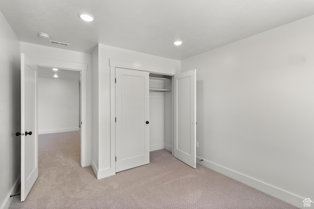 216 E 610 N, Providence, UT 84332 - unfurnished bedroom with light carpet, recessed lighting, and a closet