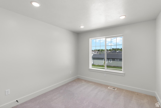 216 E 610 N, Providence, UT 84332 - unfurnished room with light carpet and recessed lighting