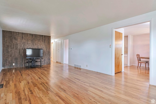 4683 W 3855 S, West Valley City, UT 84120 - living room featuring light wood finished floors and baseboards