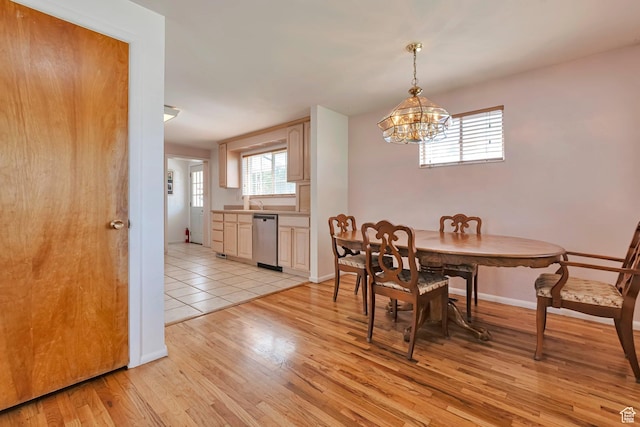 4683 W 3855 S, West Valley City, UT 84120 - dining space featuring a chandelier and light wood finished floors