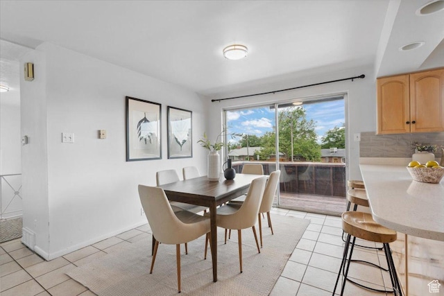 1881 S Foothill Dr E, Salt Lake City, UT 84108 - dining area featuring light tile patterned floors and baseboards