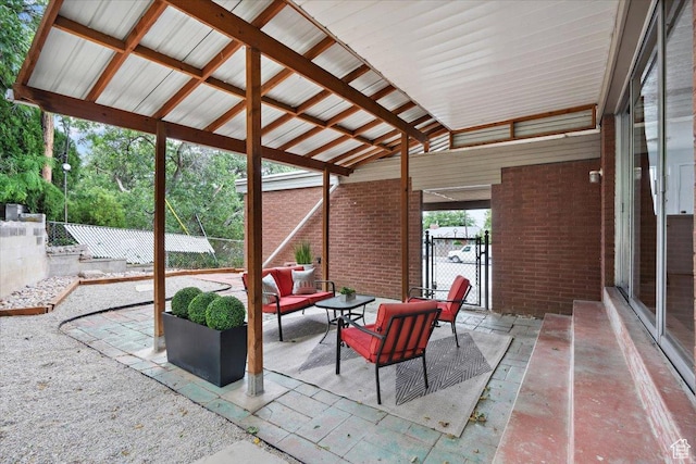 1881 S Foothill Dr E, Salt Lake City, UT 84108 - fenced backyard with a patio area, an outdoor hangout area, and a gate