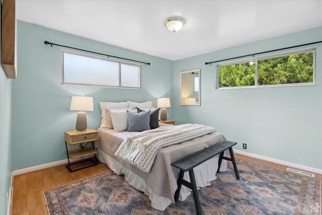 1881 S Foothill Dr E, Salt Lake City, UT 84108 - bedroom with baseboards and wood finished floors