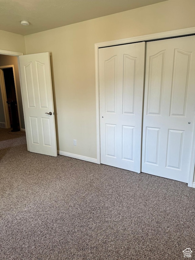 471 N 100 W, Kamas, UT 84036 - unfurnished bedroom featuring carpet flooring and a closet