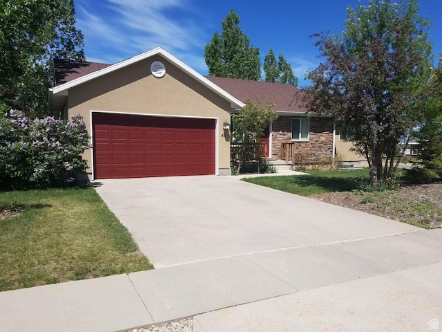 471 N 100 W, Kamas, UT 84036 - ranch-style home featuring stucco siding, a garage, stone siding, and driveway