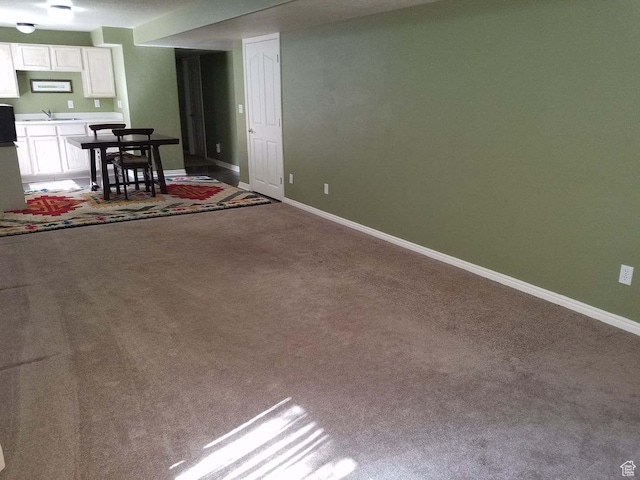471 N 100 W, Kamas, UT 84036 - carpeted living room with baseboards and a sink
