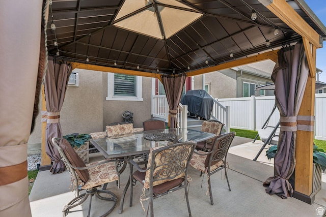 5673 S Wilson View Ct, Holladay, UT 84121 - view of patio featuring a gazebo, outdoor dining area, and a grill