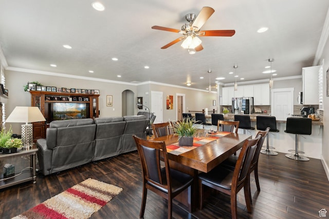5673 S Wilson View Ct, Holladay, UT 84121 - dining space featuring recessed lighting, ceiling fan, dark wood-type flooring, arched walkways, and ornamental molding