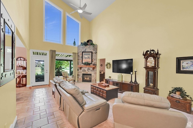 97 Hillsborough Dr, Pleasant View, UT 84414 - living room featuring high vaulted ceiling, ceiling fan, and a fireplace