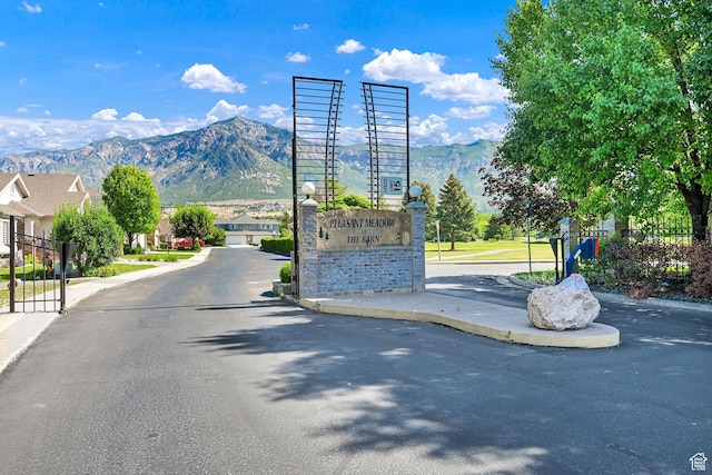 97 Hillsborough Dr, Pleasant View, UT 84414 - view of asphalt street featuring a mountain view and curbs