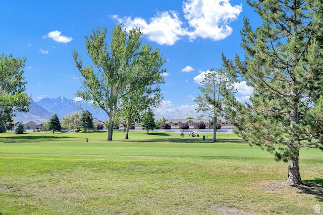 97 Hillsborough Dr, Pleasant View, UT 84414 - view of home's community featuring a lawn, a mountain view, view of golf course, and a residential view
