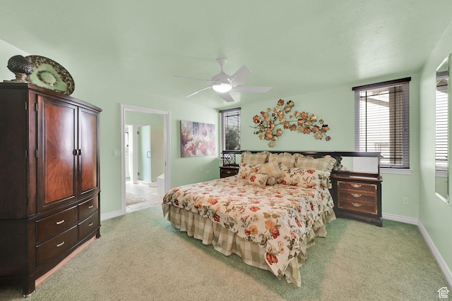 97 Hillsborough Dr, Pleasant View, UT 84414 - bedroom featuring light colored carpet, multiple windows, and ceiling fan