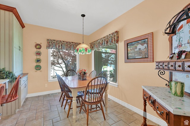 97 Hillsborough Dr, Pleasant View, UT 84414 - dining area with stone finish flooring and plenty of natural light