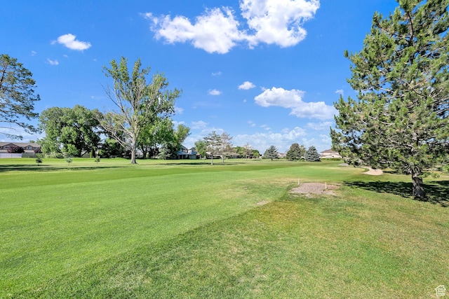 97 Hillsborough Dr, Pleasant View, UT 84414 - view of home's community featuring a lawn and view of golf course