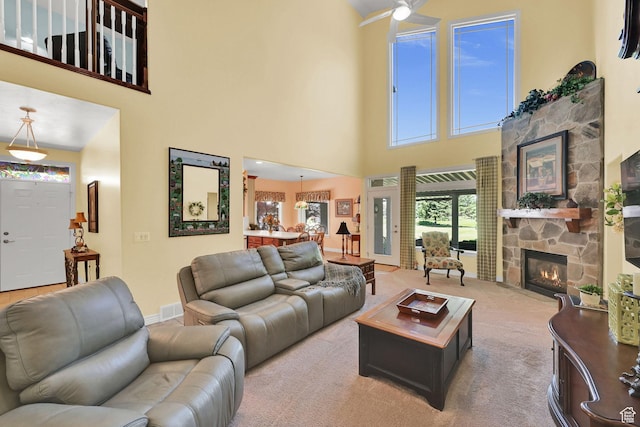 97 Hillsborough Dr, Pleasant View, UT 84414 - living area with a fireplace, a towering ceiling, and ceiling fan