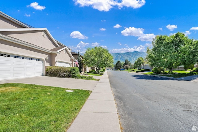 97 Hillsborough Dr, Pleasant View, UT 84414 - view of asphalt road with a mountain view and a residential view