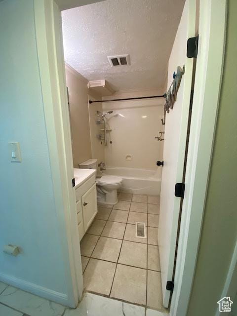 314 W Center St N Unit 135, Bountiful, UT 84010 - full bath featuring vanity, tub / shower combination, a textured ceiling, and tile patterned floors