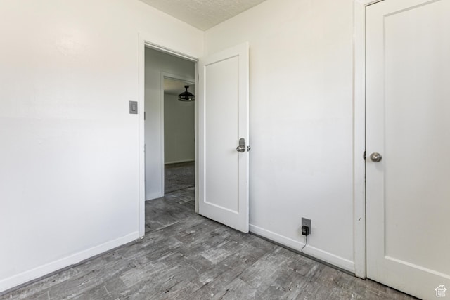 317 Highland Dr, Tooele, UT 84074 - empty room featuring wood finished floors and a textured ceiling