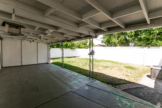 317 Highland Dr, Tooele, UT 84074 - fenced backyard with a patio area