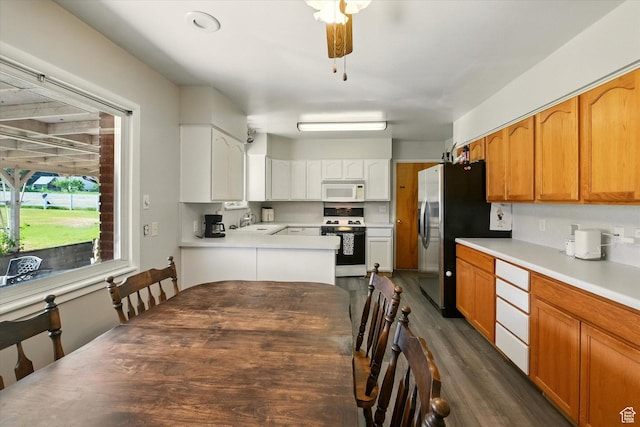 2280 N 800 E, North Logan, UT 84341 - kitchen featuring white appliances, dark wood-type flooring, light countertops, and white cabinetry