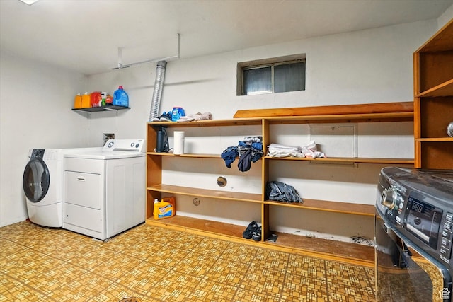 2280 N 800 E, North Logan, UT 84341 - washroom with washer and clothes dryer and light flooring