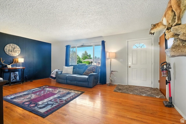 2280 N 800 E, North Logan, UT 84341 - living room featuring plenty of natural light, wood finished floors, and a textured ceiling