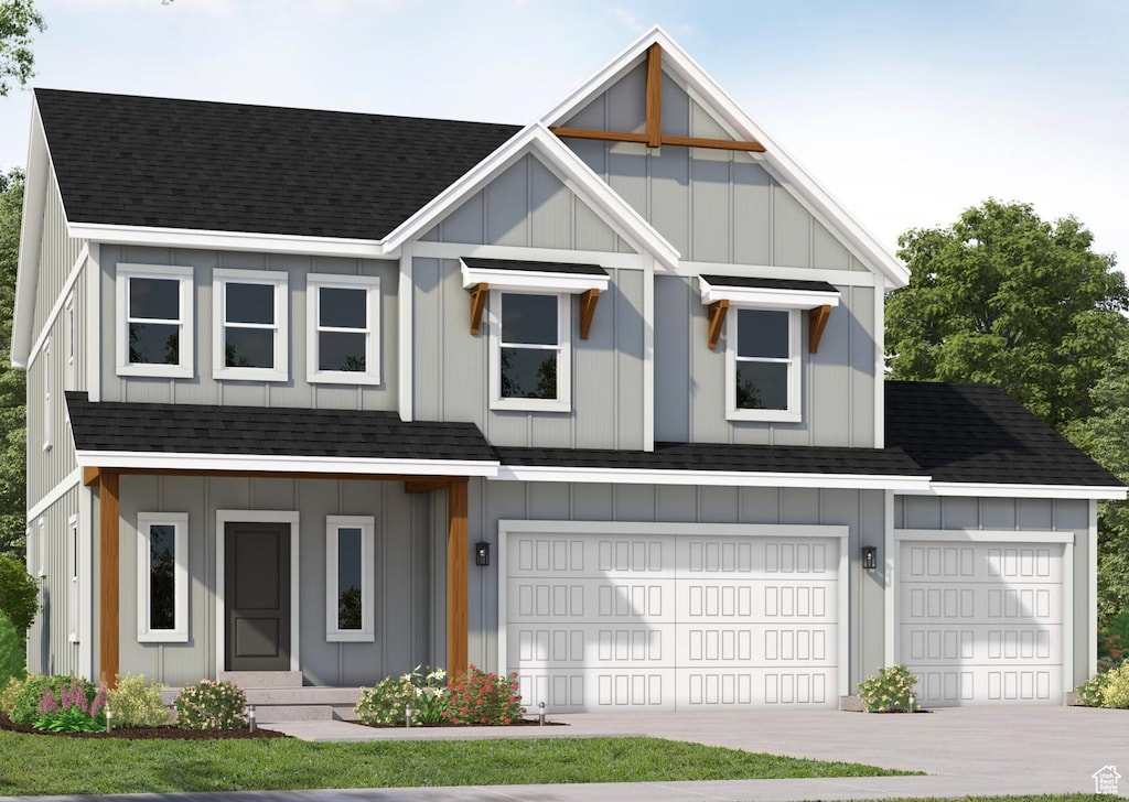 1089 E Blackfeet Dr Unit 518, Eagle Mountain, UT 84005 - view of front facade featuring a shingled roof, board and batten siding, driveway, and an attached garage