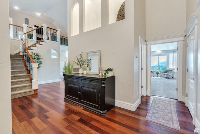 215 N Bald Mountain Dr E, Alpine, UT 84004 - entrance foyer with a high ceiling, dark wood-type flooring, and stairway