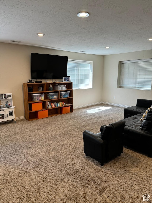 215 N Bald Mountain Dr E, Alpine, UT 84004 - carpeted living area featuring a textured ceiling and recessed lighting