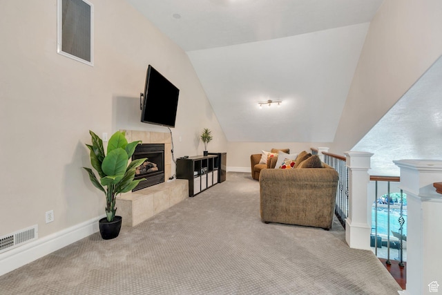 215 N Bald Mountain Dr E, Alpine, UT 84004 - carpeted living area featuring vaulted ceiling and a tiled fireplace