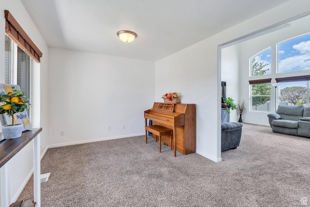 2459 E Ox Yoke Dr S, Eagle Mountain, UT 84005 - living area with carpet flooring and baseboards