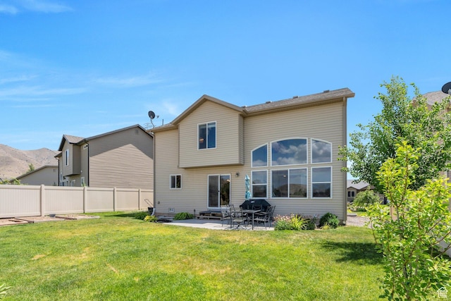 2459 E Ox Yoke Dr S, Eagle Mountain, UT 84005 - rear view of house with a patio