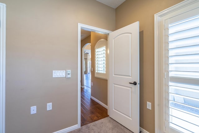 1410 W Ambassador Dr, St George, UT 84790 - hall with arched walkways and wood finished floors